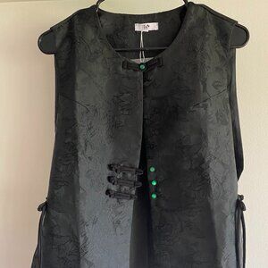Sleeveless brocade black vest with frog closures